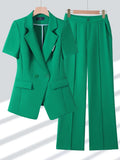 Traje de pantalón verde