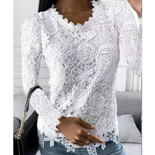 Blusa elegante de manga larga con aberturas