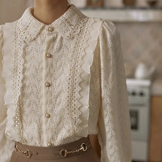 Elegante blusa vintage con bordado de encaje